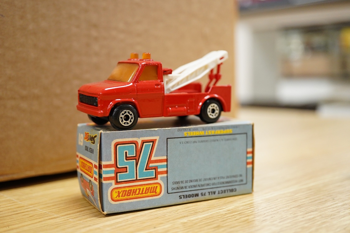 Twelve boxed Matchbox Superfast and Rola-matics 1-75 vehicles; rescue hovercraft (2), Porsche turbo (3), Mercedes tourer (6), Rover 3500 (8), car transporter (11), the Londoner bus (17), Silver Jubilee bus, cement truck